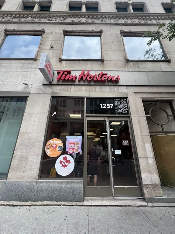 Tim Hortons storefront and interior at 1257 Rue Peel, Montreal, QC