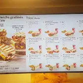 Tim Hortons storefront and interior at 1257 Rue Peel, Montreal, QC