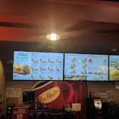 Tim Hortons storefront and interior at 1508 Rue De Bleury, Montreal, QC