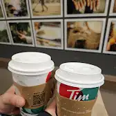 Tim Hortons storefront and interior at 1550, Boul. De Maisonneuve, Montreal, QC
