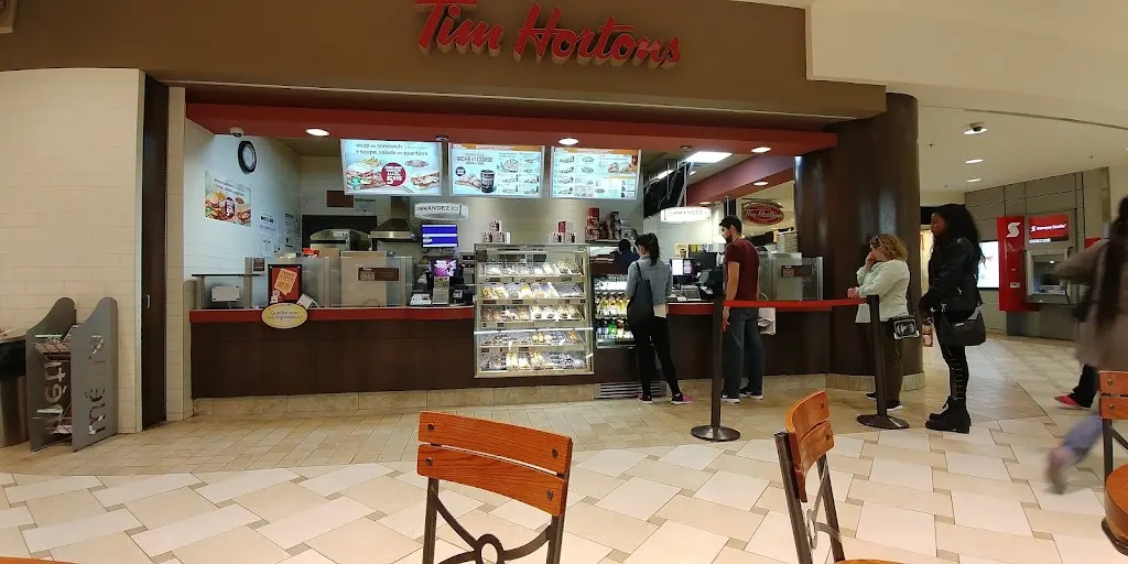Tim Hortons storefront and interior at 2021 Av Union, Montreal, QC