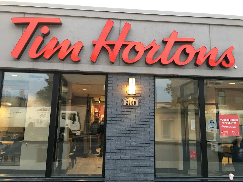 Tim Hortons storefront and interior at 2700, Rue Ontario Est, Montreal, QC