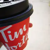 Tim Hortons storefront and interior at 2700, Rue Ontario Est, Montreal, QC