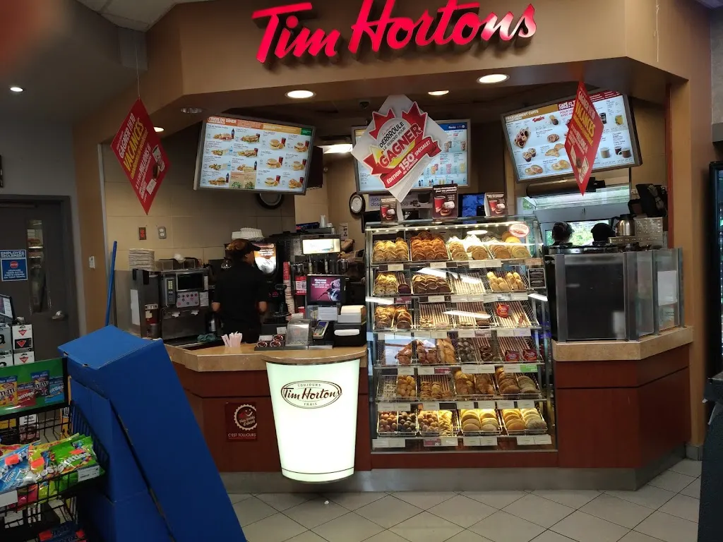 Tim Hortons storefront and interior at 3881 Rue Sherbrooke Est, Montreal, QC