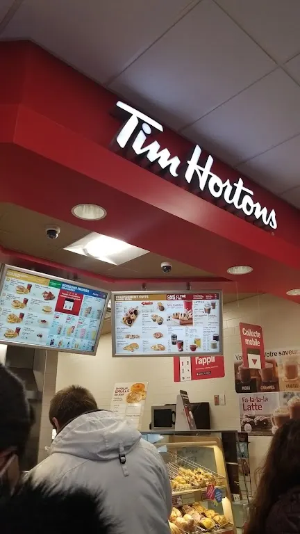 Tim Hortons storefront and interior at 5405 Blvd Decarie, Montreal, QC
