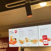 Tim Hortons storefront and interior at 5778 Rue Notre-dame Est, Montreal, QC