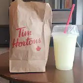Tim Hortons storefront and interior at 5778 Rue Notre-dame Est, Montreal, QC