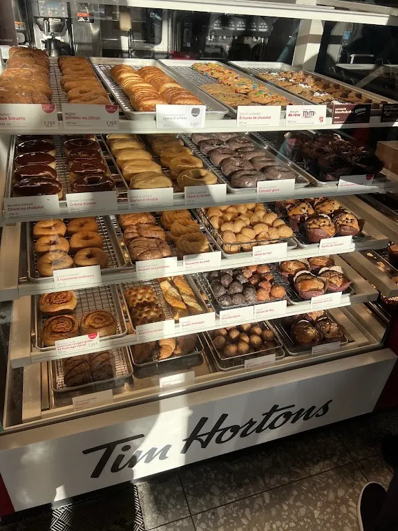 Tim Hortons storefront and interior at 5915 Rue Bélanger, Montreal, QC