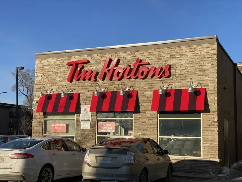 Tim Hortons storefront and interior at 5985, Ch De La Cote-des-neiges, Montreal, QC