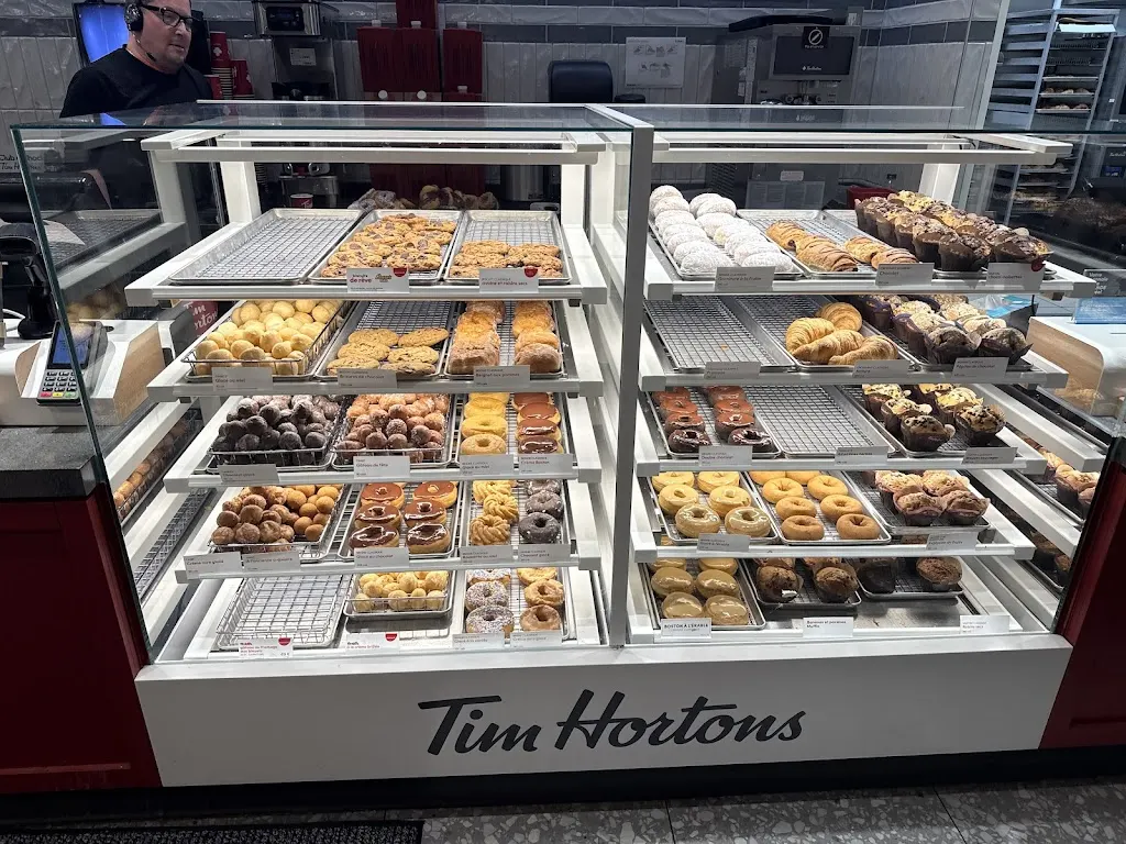 Tim Hortons storefront and interior at 7950 Boul Henri-bourassa Est, Montreal, QC