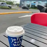 Tim Hortons storefront and interior at 9255 Boul De L'acadie, Montreal, QC