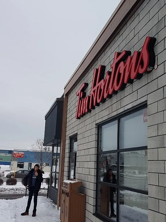 Tim Hortons storefront and interior at 9725 Boul Henri Bourassa Est, Montreal, QC