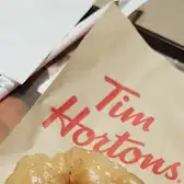 Tim Hortons storefront and interior at 12451 Boul Rudolphe-forget, Montreal, QC