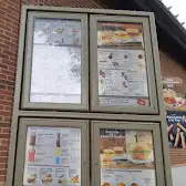 Tim Hortons storefront and interior at 15560 Rue Sherbrooke Est, Montreal, QC