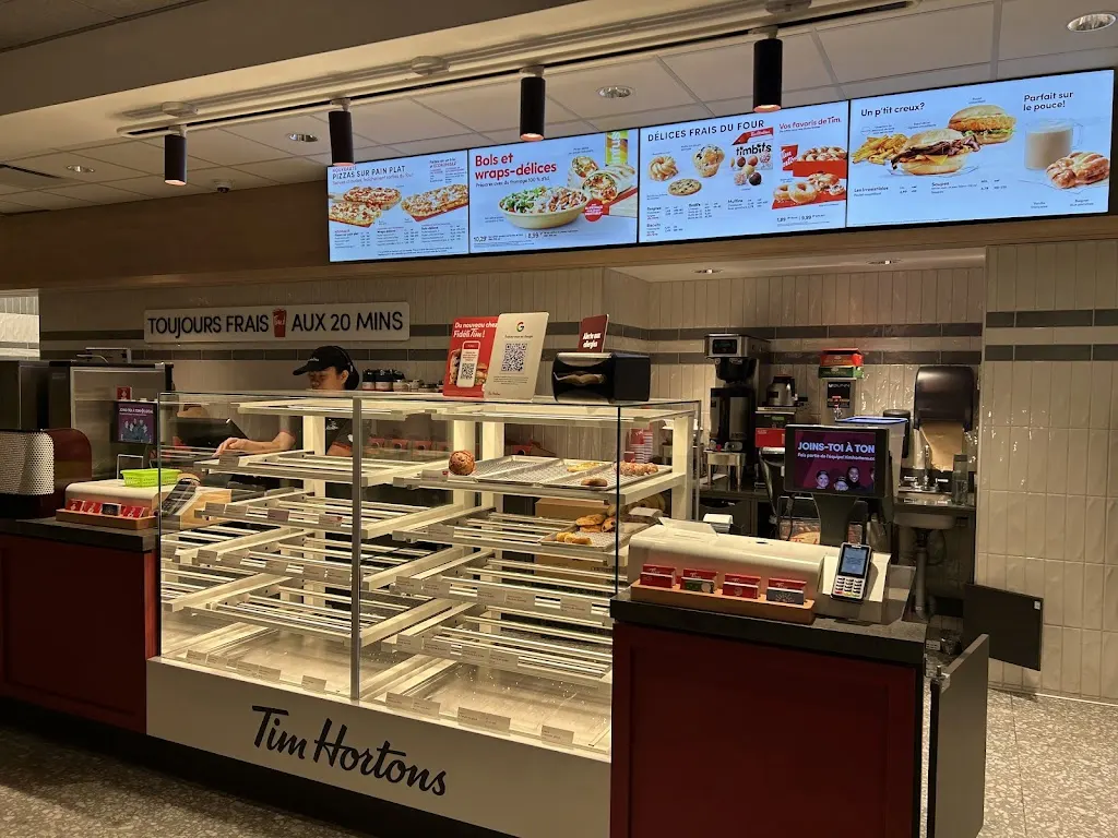 Tim Hortons storefront and interior at 148 Route 132 Ouest, New Richmond, QC
