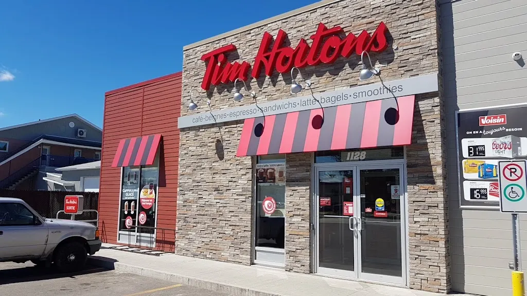 Tim Hortons storefront and interior at 1128 Ave Du Rocher, Normandin, QC