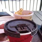 Tim Hortons storefront and interior at 387 Rue Papineau, Papineauville, QC