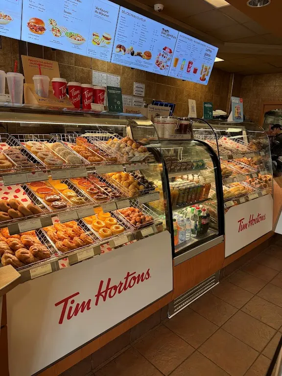 Tim Hortons storefront and interior at 183g Boul Hymus, Pointe-claire, QC