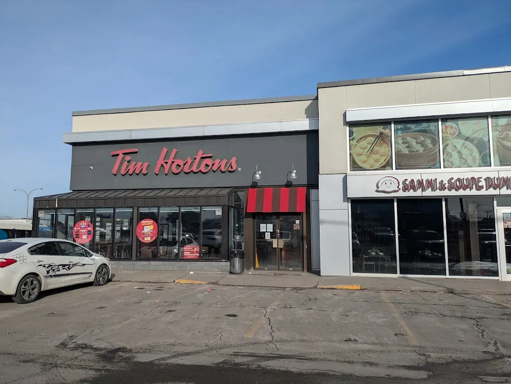 Tim Hortons storefront and interior at 305 Boul Brunswick, Pointe-claire, QC