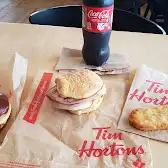 Tim Hortons storefront and interior at 7 Rue Shelter Bay, Port-cartier, QC