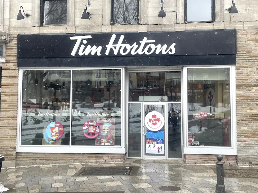 Tim Hortons storefront and interior at 4 - Côte De La Fabrique, Quebec, QC