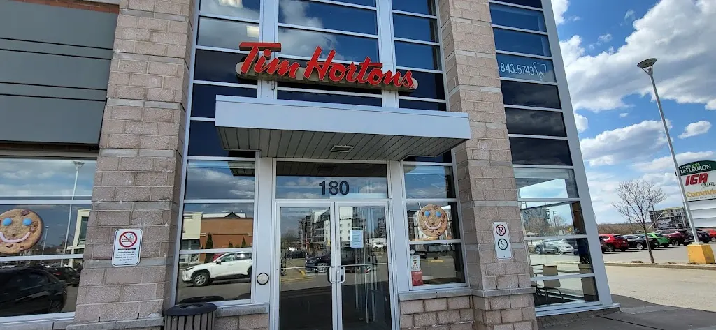 Tim Hortons storefront and interior at 2293 Av Chauveau Local 180, Quebec, QC
