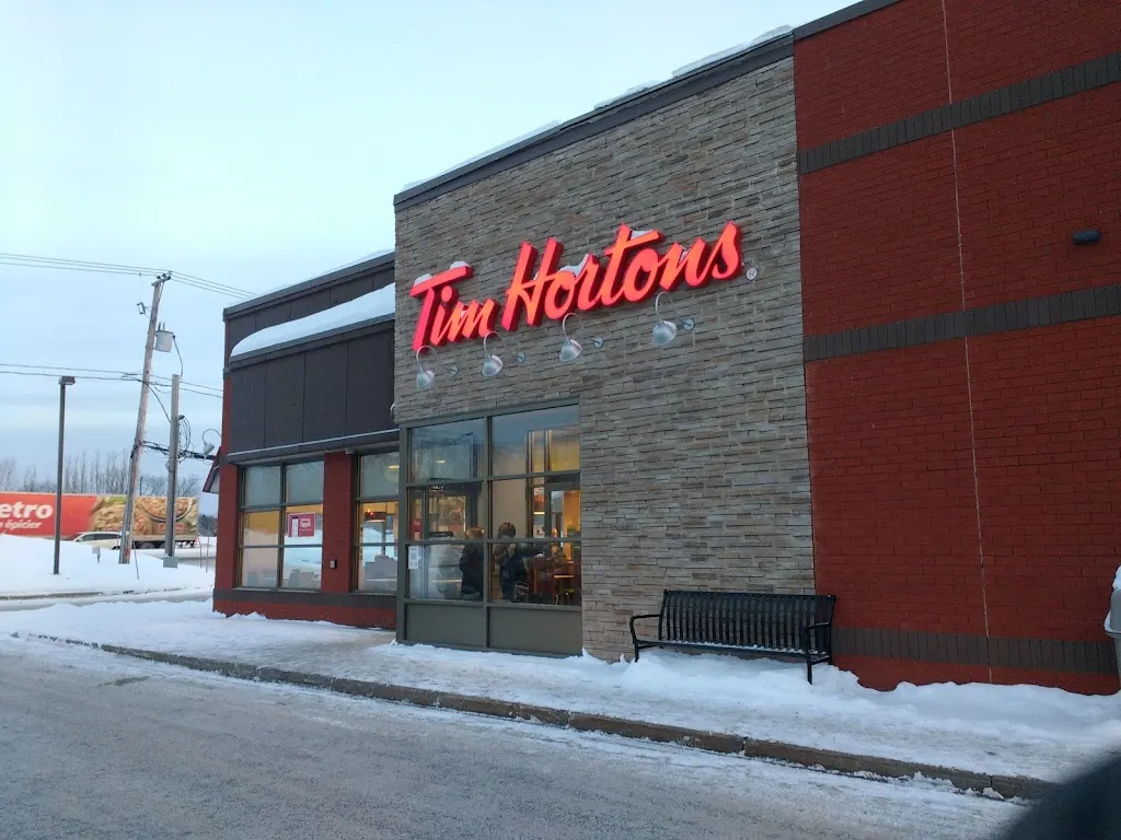 Tim Hortons storefront and interior at 5143 Boul Chauveau Ouest, Quebec, QC