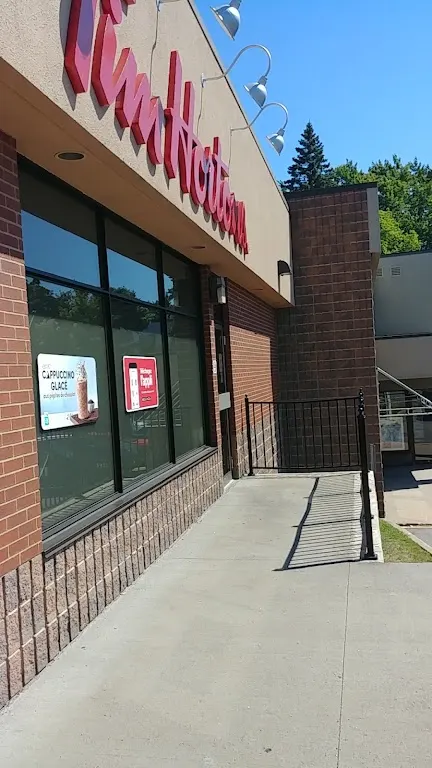 Tim Hortons storefront and interior at 7730 Boul Henri Bourassa, Quebec, QC