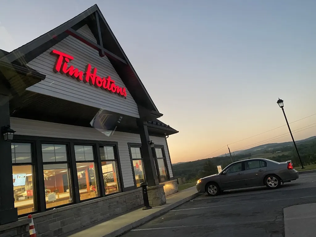 Tim Hortons storefront and interior at 150 Route 116, Richmond, QC