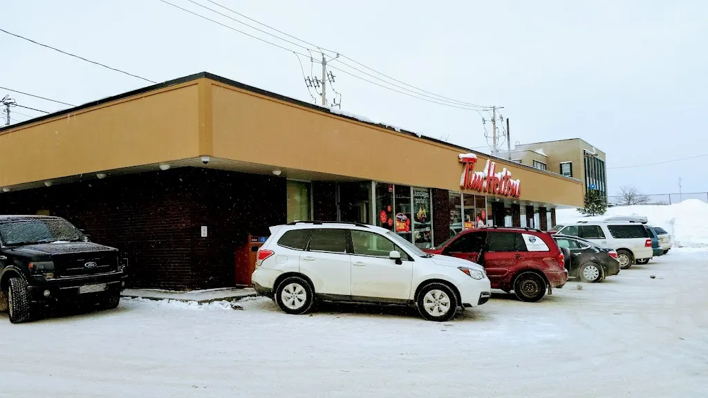 Tim Hortons storefront and interior at 4 Av Principale, Rouyn-noranda, QC