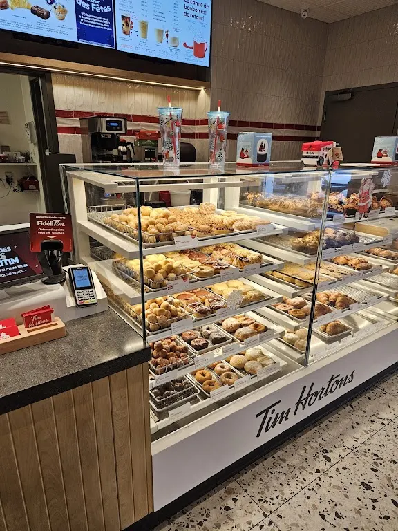 Tim Hortons storefront and interior at 2728 - Boulevard Du Saguenay, Saguenay, QC