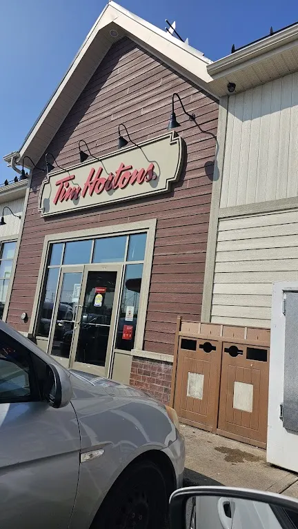 Tim Hortons storefront and interior at 1020 Route Louis Cyr, Saint-jean-de-matha, QC