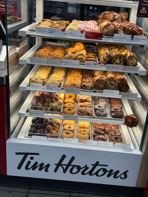 Tim Hortons storefront and interior at 10 Av Ste-croix, Saint-laurent, QC