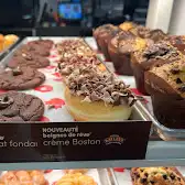 Tim Hortons storefront and interior at 8300 Trans-canada Hwy, Saint-Laurent, QC