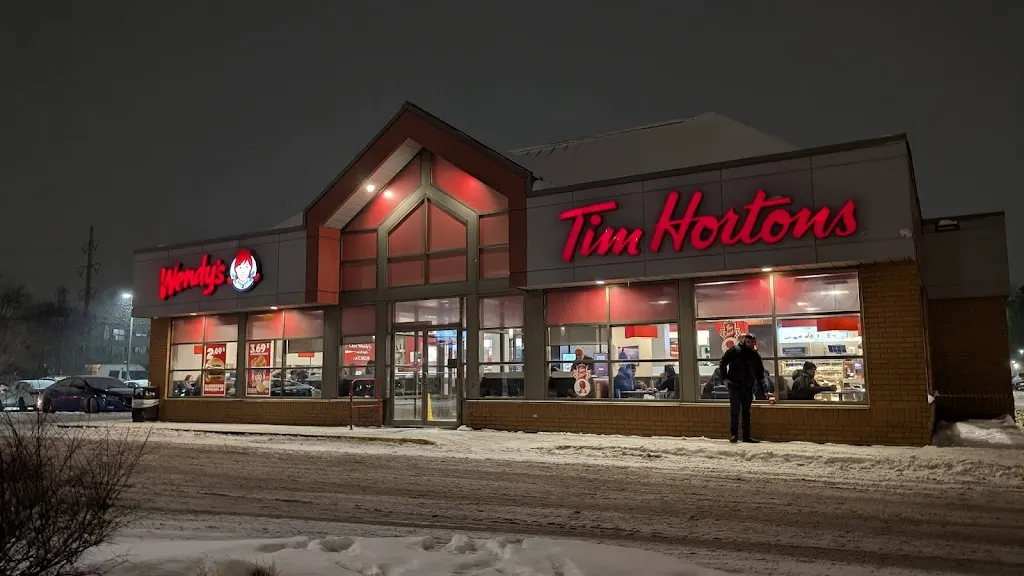 Tim Hortons storefront and interior at 5005, Jean-talon Est, Saint Leonard, QC