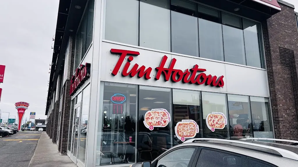 Tim Hortons storefront and interior at 6245, Boul. Metropolitain Est, Saint Leonard, QC
