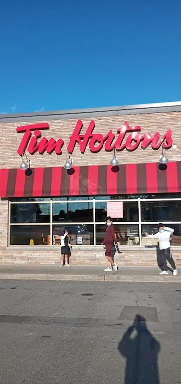 Tim Hortons storefront and interior at 1025 Rue St Isidore, Saint-lin-laurentides, QC