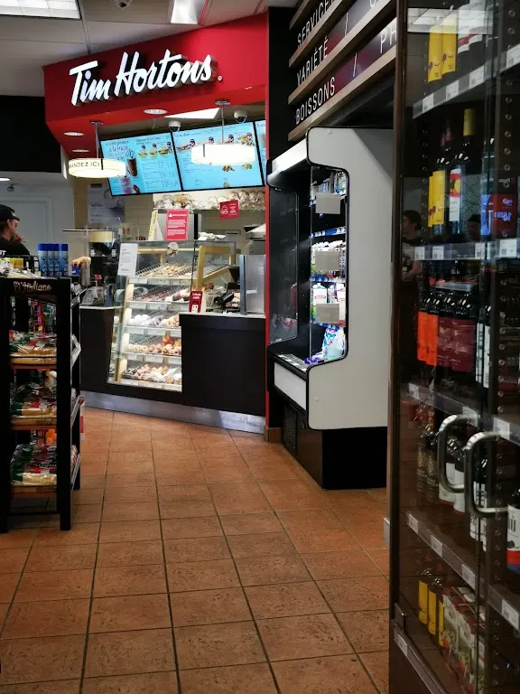 Tim Hortons storefront and interior at 166 Rue Turgeon, Sainte-thérèse, QC