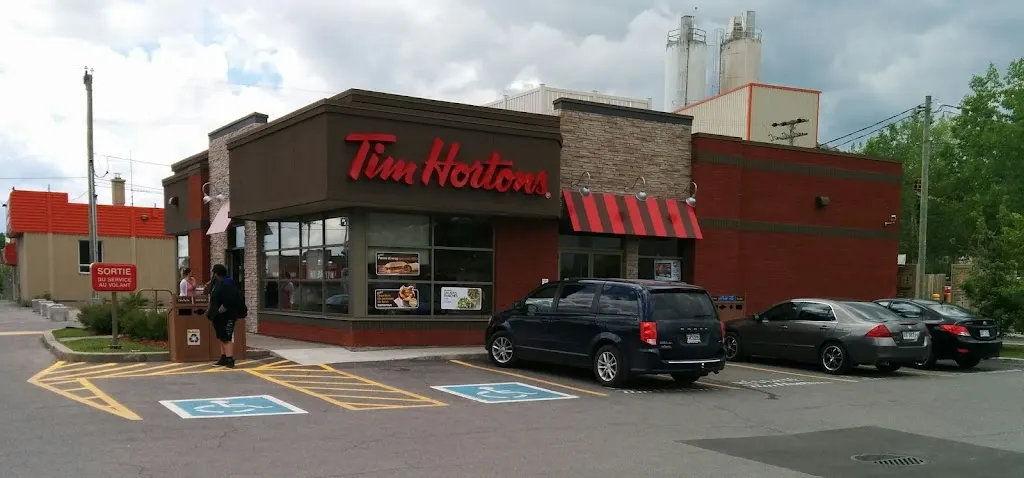 Tim Hortons storefront and interior at 313, Boul. Cure-labelle, Sainte-thérèse, QC