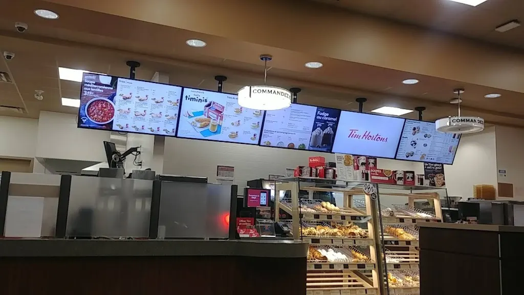 Tim Hortons storefront and interior at 3825 Rue College, Sherbrooke, QC