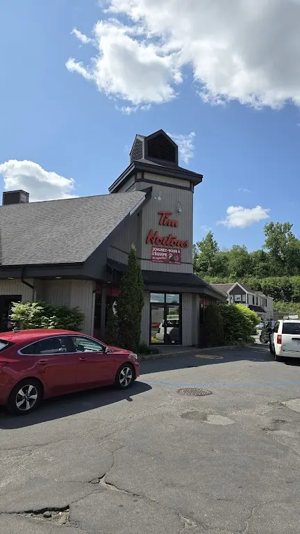 Tim Hortons storefront and interior at 202 Av De La Gare, St-sauveur, QC