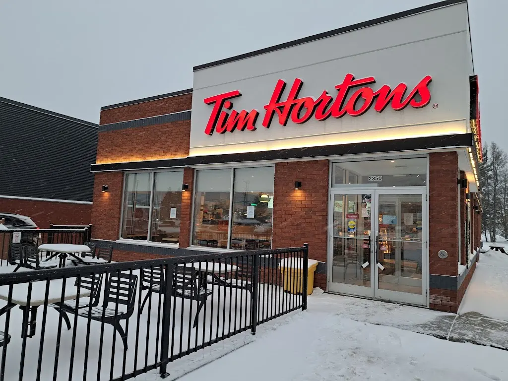 Tim Hortons storefront and interior at 2350 Boul Ste-sophie, Ste-sophie, QC