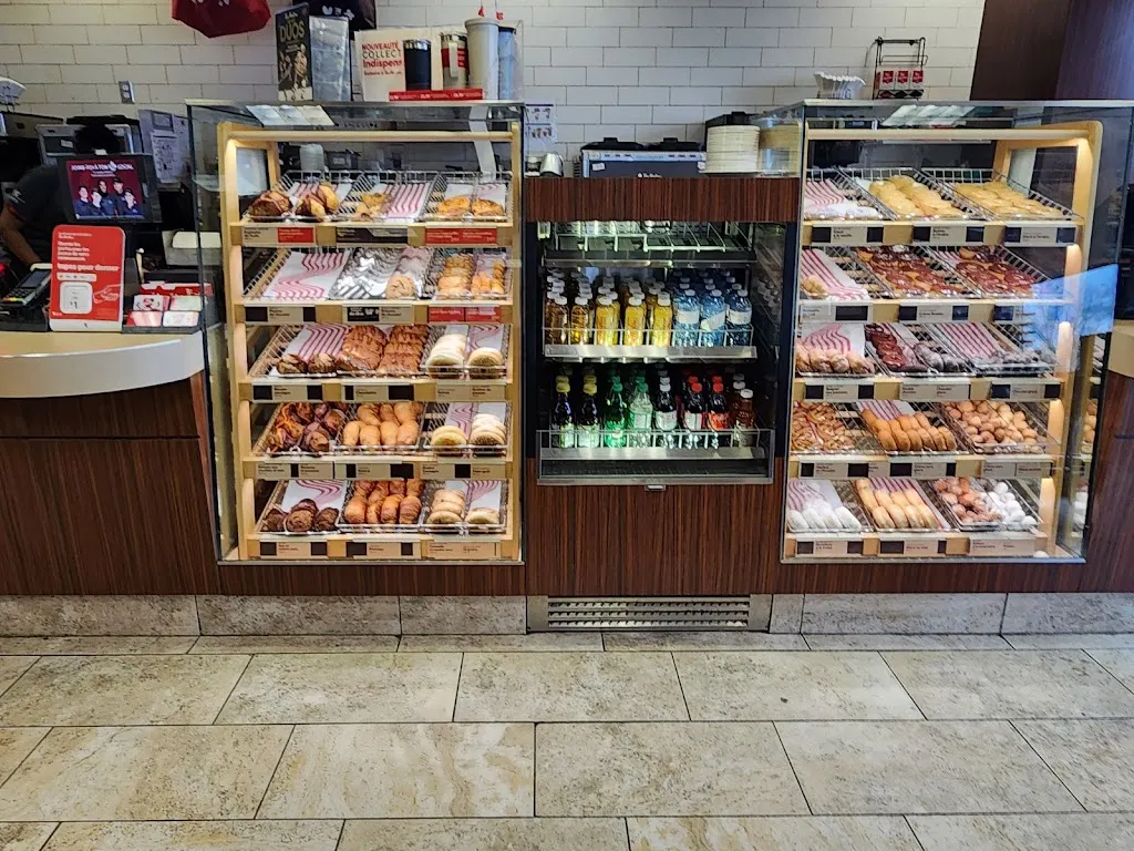 Tim Hortons storefront and interior at 1030 Boul Moody, Terrebonne, QC