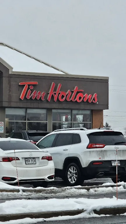 Tim Hortons storefront and interior at 1157, Montee Des Pionniers, Terrebonne, QC