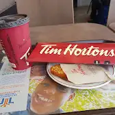 Tim Hortons storefront and interior at 2795 Claude Léveillée, Terrebonne, QC