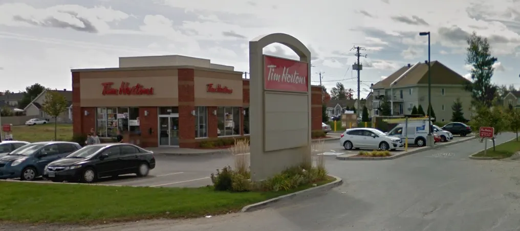 Tim Hortons storefront and interior at 7200 Boul Laurier, Terrebonne, QC