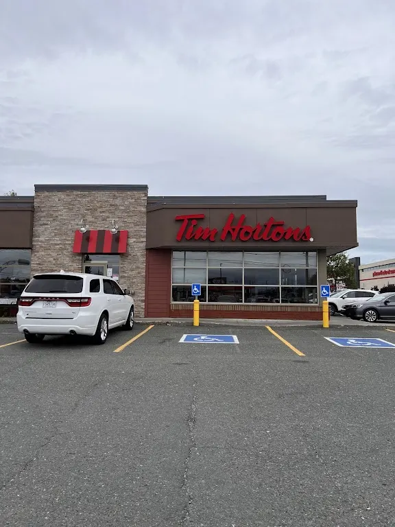 Tim Hortons storefront and interior at 1021 St Alphonse Nord, Thetford Mines, QC