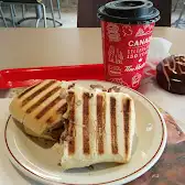 Tim Hortons storefront and interior at 1021 St Alphonse Nord, Thetford Mines, QC