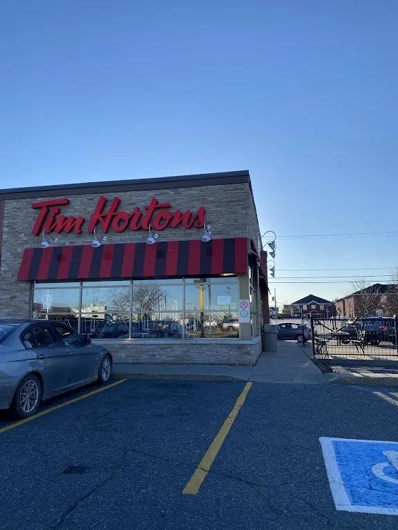 Tim Hortons storefront and interior at 320 Boul De La Marine, Varennes, QC