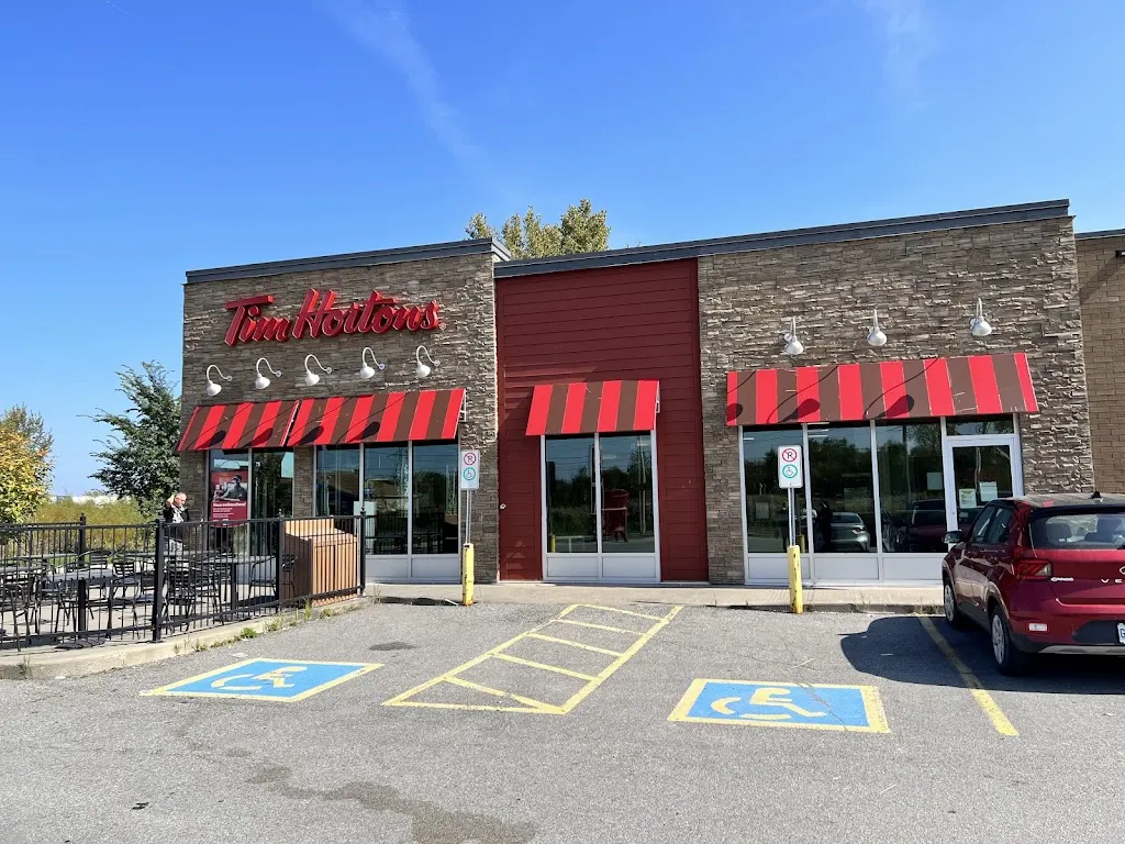 Tim Hortons storefront and interior at 2440 Rue Henry Ford, Vaudreuil-dorion, QC